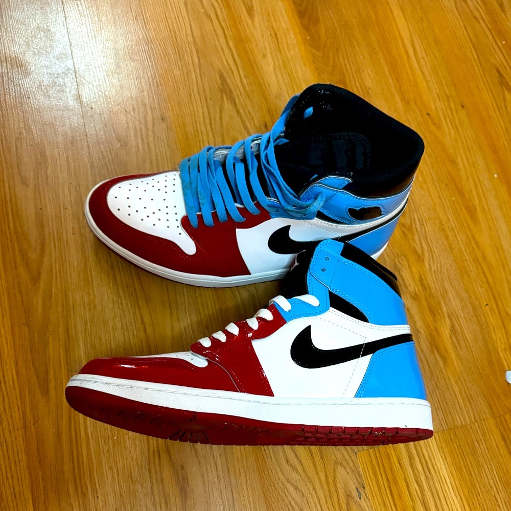 Never worn Baby blue white and red size 12 M Nike Jordan’s